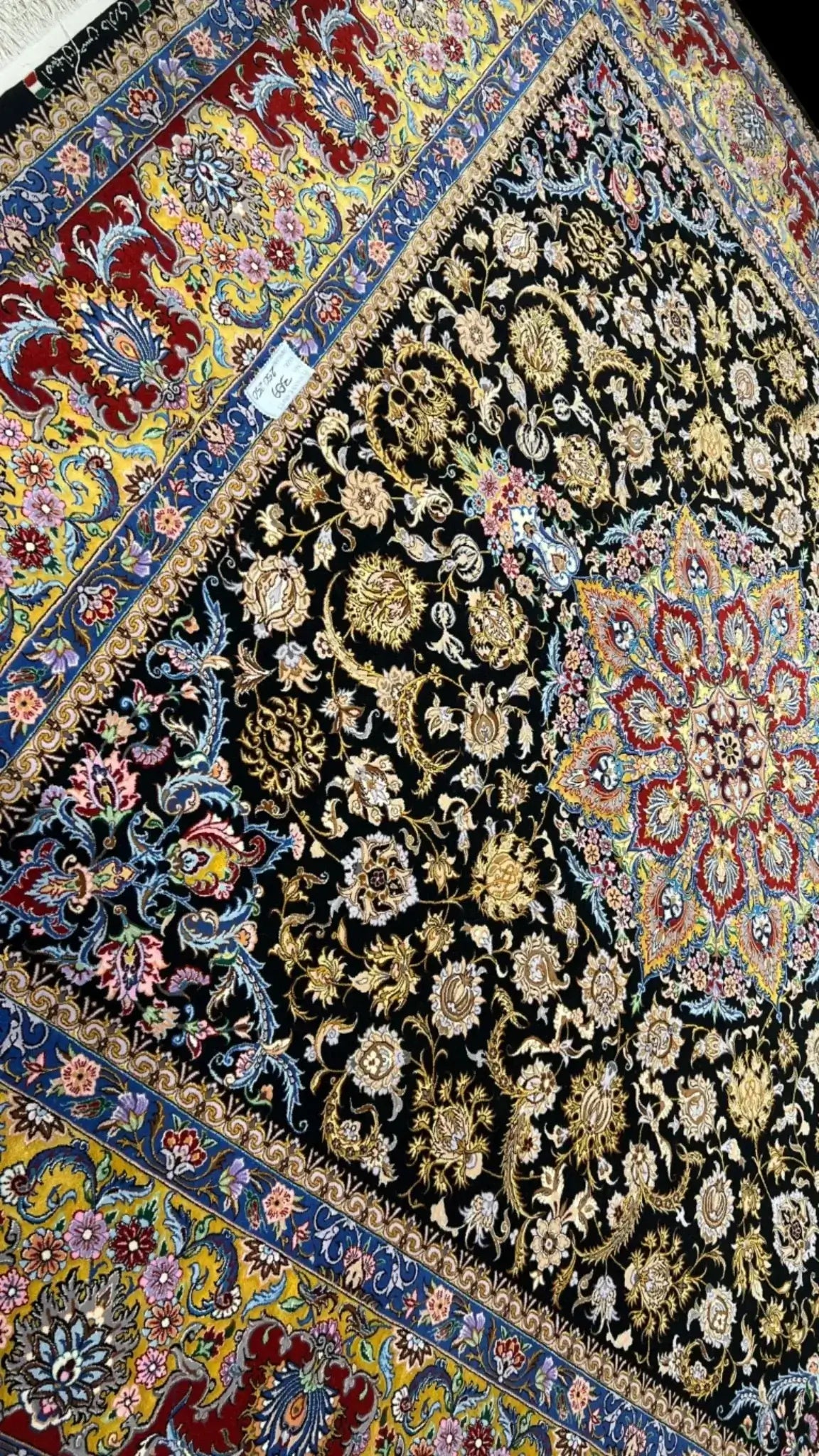 "Elegant Isfahan Persian rug, crafted with wool and silk, measuring 259 cm x 250 cm. Hand-knotted in Iran, this rug offers a high knot density for durability and style."